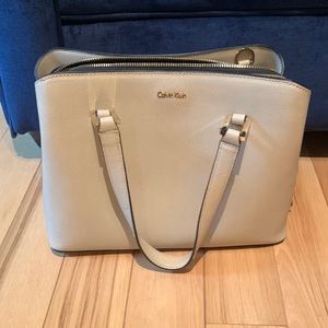 Calvin Klein taupe/beige leather tote purse. Silver hardware. Used once.